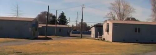 A scene from Joe Spendolini's video about Henley Elementary School, showing the library and other resource trailers.